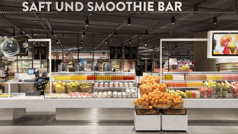 Well-known clients of the Schweitzer Project AG include, among others, Carrefour, Edeka (on the picture: subsidiary in Düsseldorf), REWE, Nespresso, United Colors of Benetton and Armani.