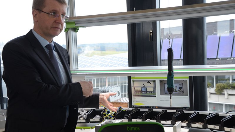 Andreas Fischer, junior manager and son of Ernst Fischer, at an assembly station: "Our electronic laboratory tables have started a real revolution".