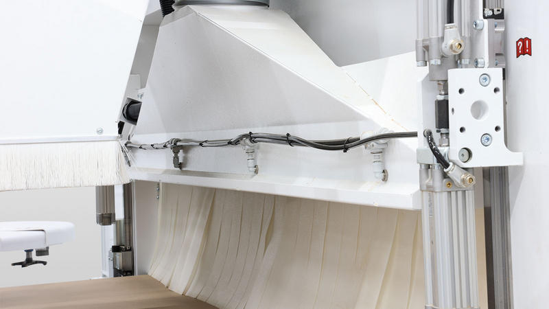 Kombinierte Absaug- und  Ausschiebevorrichtung 