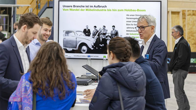 Our consultants in conversation at our trade fair stand